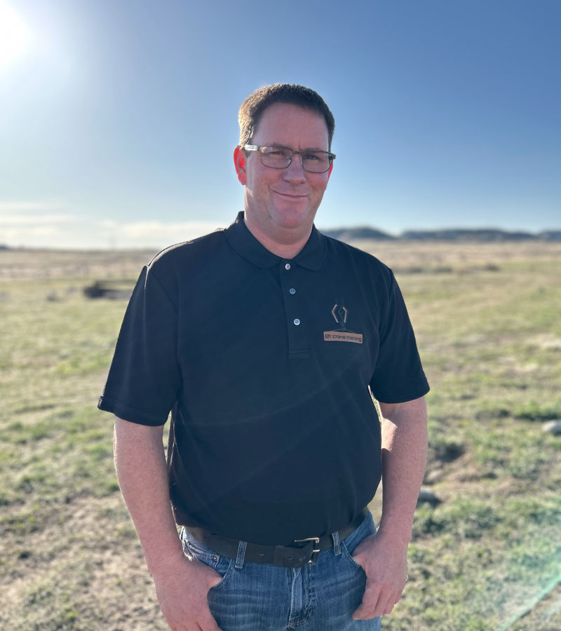 Wes Rosenlund, owner and operator of Lift Crane LLC, standing in an open Wyoming field